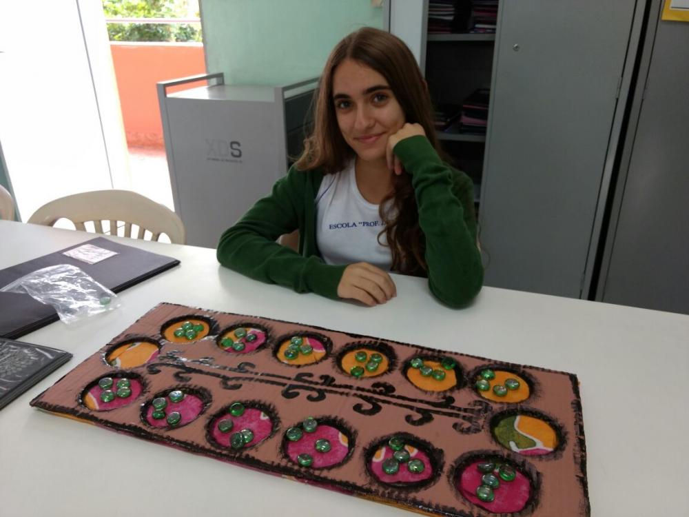 O Objetivo do jogo Mancala é: AULA 25 * acumular mais sementes que o  oponente no seu depósito (kalaha). 